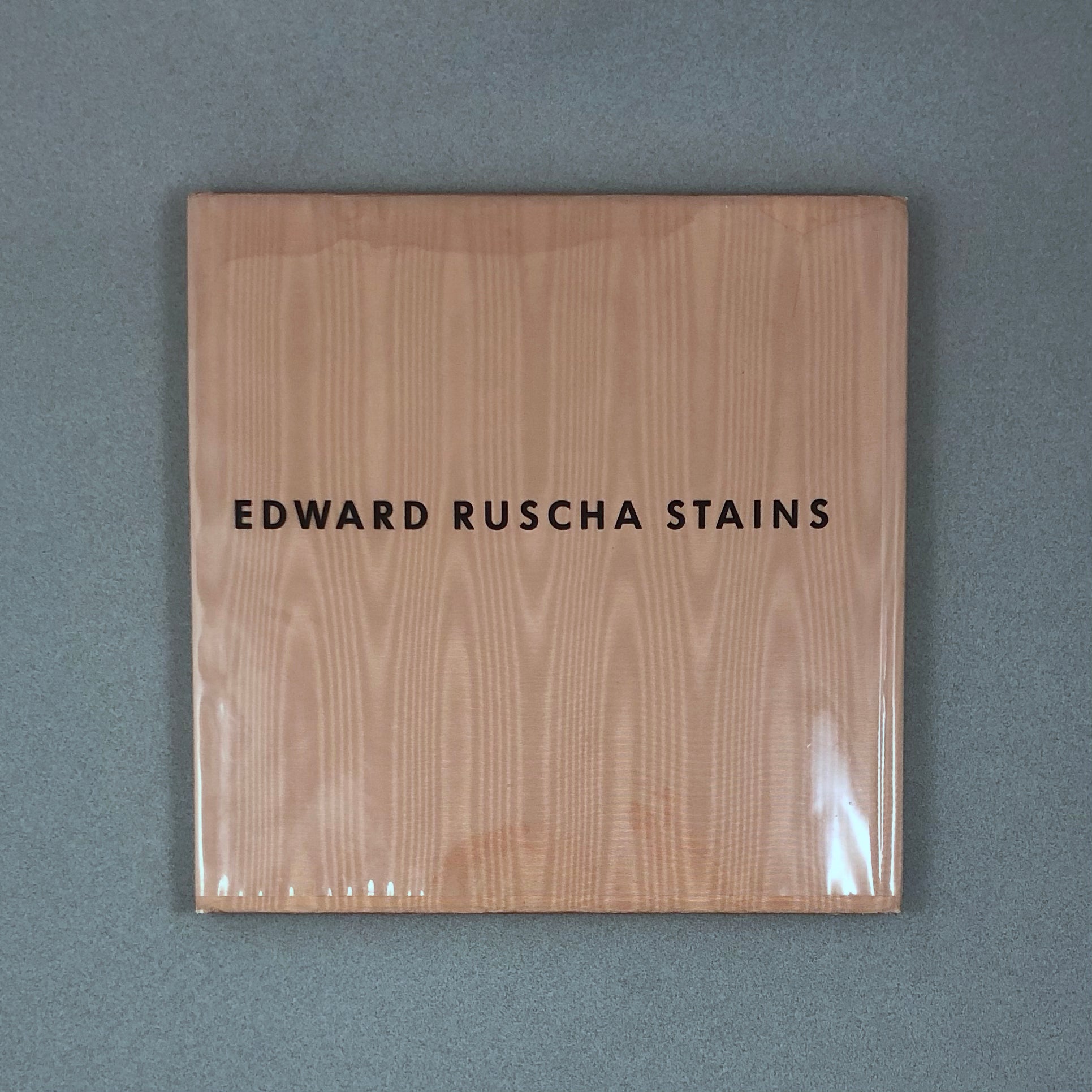 STAINS BY EDWARD RUSCHA