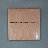 STAINS BY EDWARD RUSCHA